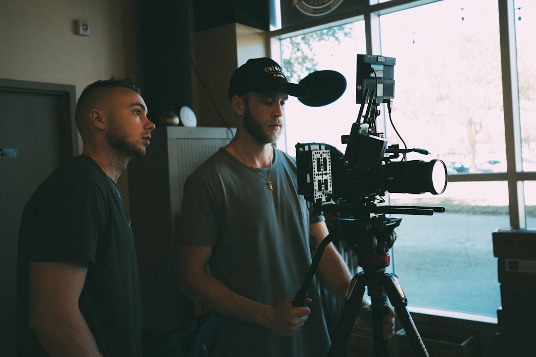 Diverse team of television studio production professionals standing together